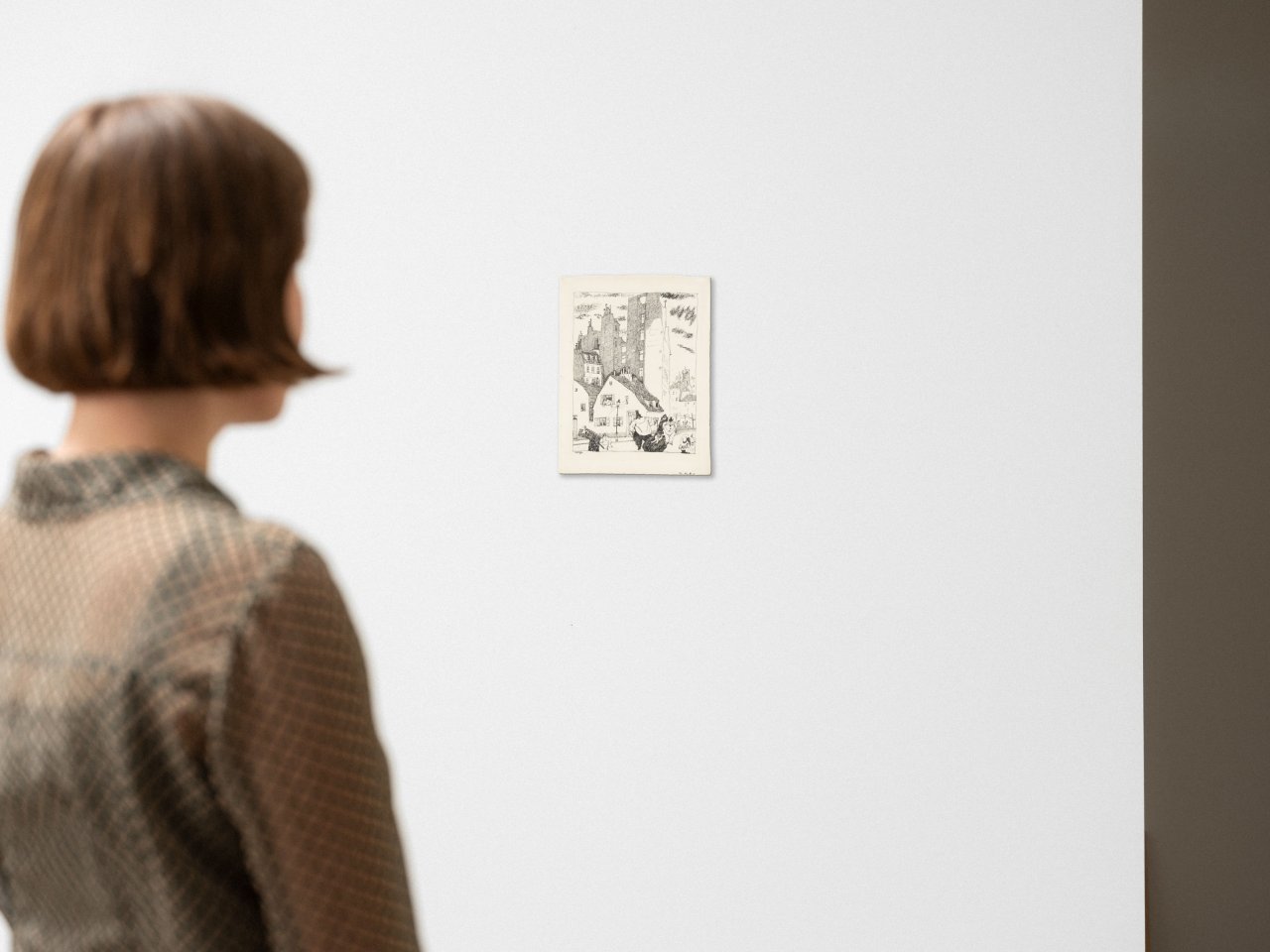 Auf diesem Bild ist das folgende Kunstwerk zu sehen: Lyonel Feininger. Hohe Häuser. 1910.