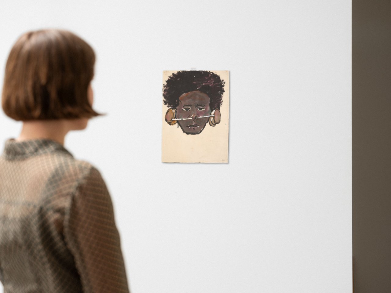 Auf diesem Bild ist das folgende Kunstwerk zu sehen: Emil Nolde. „Junger Mann aus Papua-Neuguinea mit Ohr- und Nasenschmuck“. 1914.