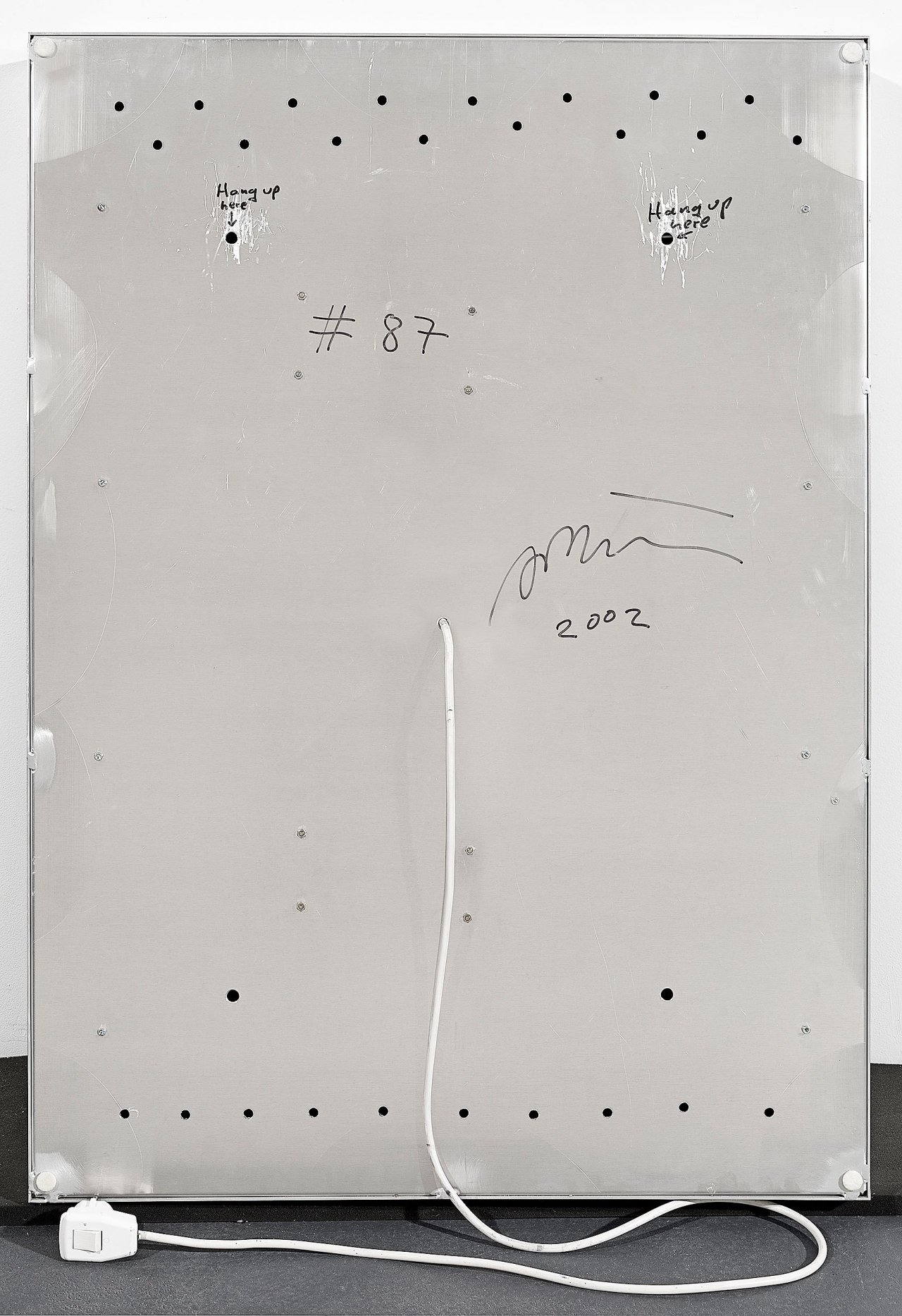 This picture shows the following artwork: Daniele Buetti. Light box # 87. How can the Drops of Water know themselves to be a River?. 2002.