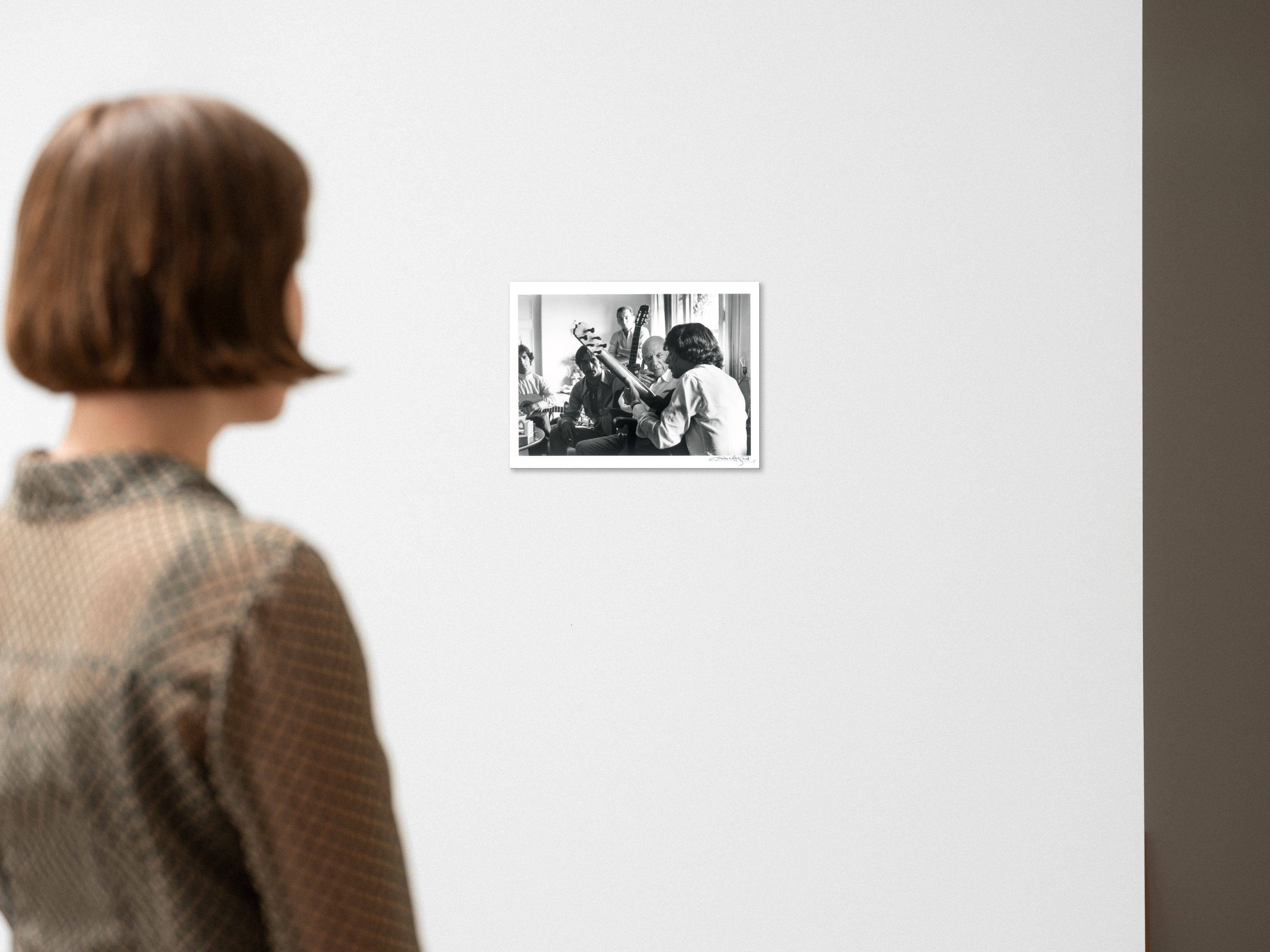 This picture shows the following artwork: Lucien Clergue. ”Picasso and Manitas de Plata, Mougins, N.[otre] D.[ame] de Vie”. 1968.