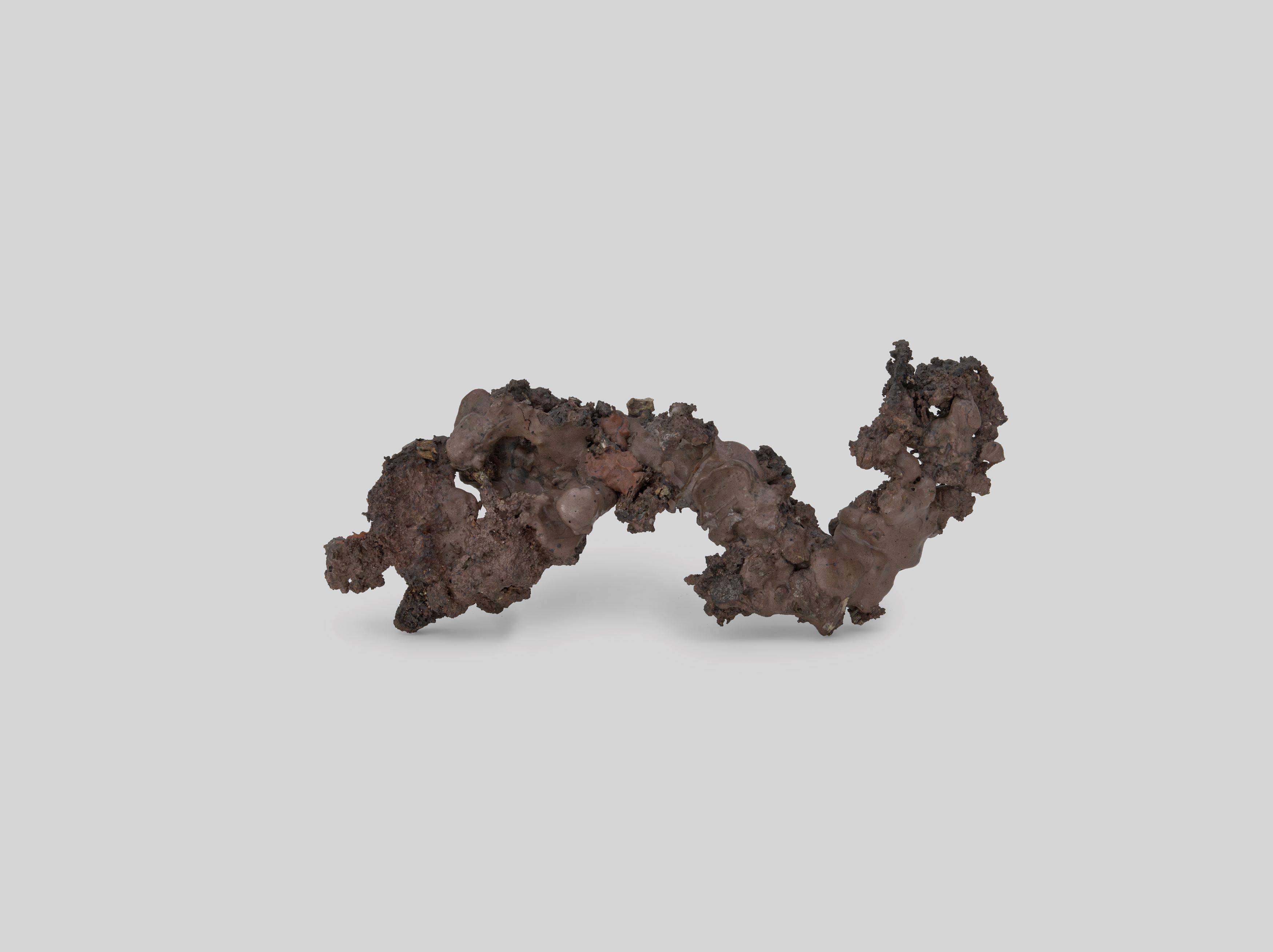 This picture shows the following artwork: Hermann Glöckner. Wellenform aus Schlacken. 1960.