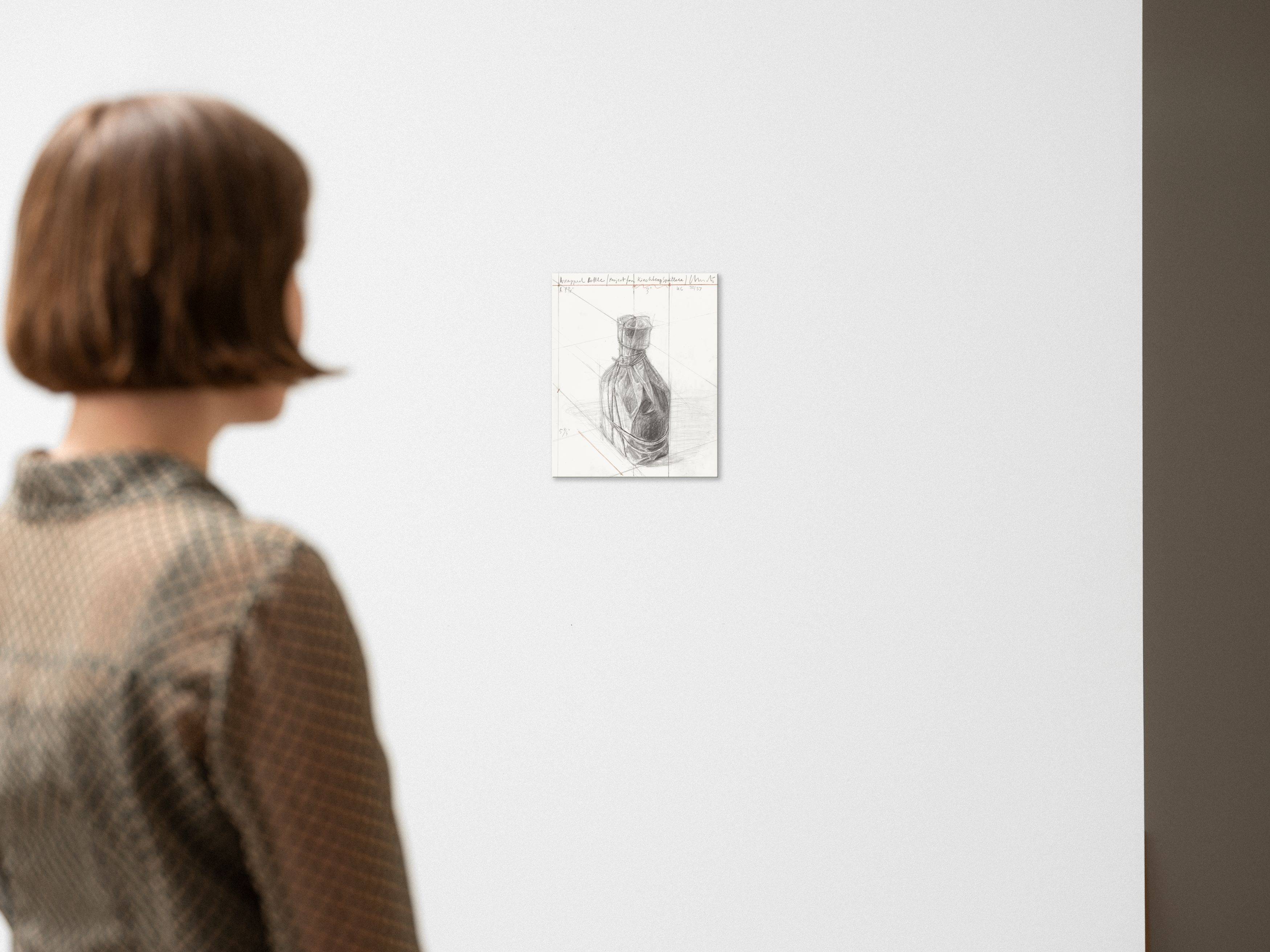 This picture shows the following artwork:  Christo and Jeanne-Claude. ”Wrapped Bottle”. 2002.
