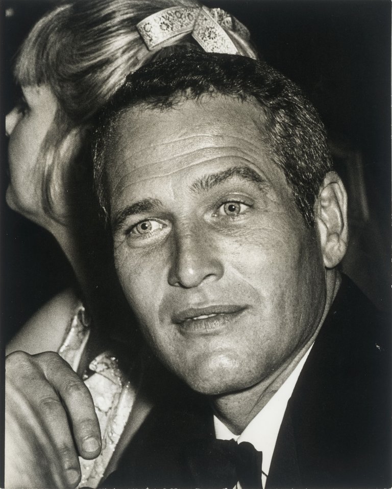 This picture shows the following artwork: Ron Galella (i.e. Galella, Ronald E.). Paul Newman at 'Cool Hand Luke' premiere at the American Hotel, New York City. 1967.